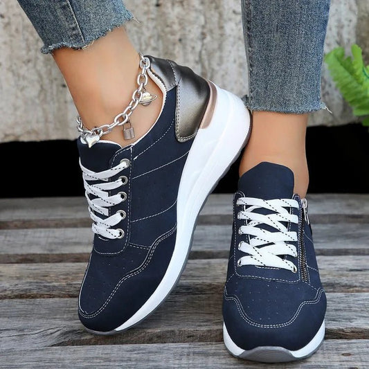 Mandotos International stylish lace-up sneakers with zipper detail and medium heel height, perfect for casual and trendy outfits.
