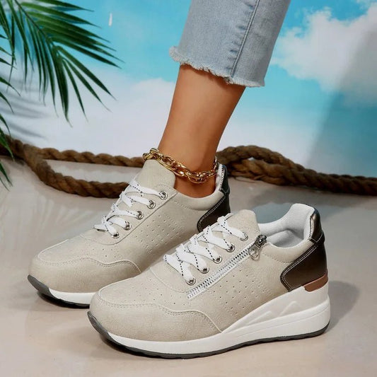 Fashionable lace-up sneakers with zipper detail and medium heel from MANDOTOS INTERNATIONAL, showing stylish design and comfortable fit.