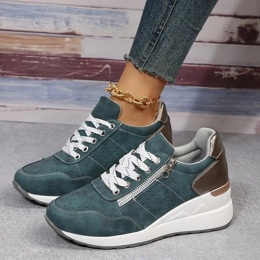Fashionable lace-up sneakers with zipper detail and medium heel height from MANDOTOS INTERNATIONAL, showing stylish design and comfort.