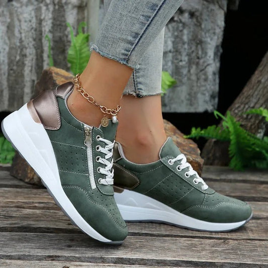 Fashionable lace-up sneakers with zipper detail and medium heel height from MANDOTOS INTERNATIONAL, showcasing stylish design and comfort.