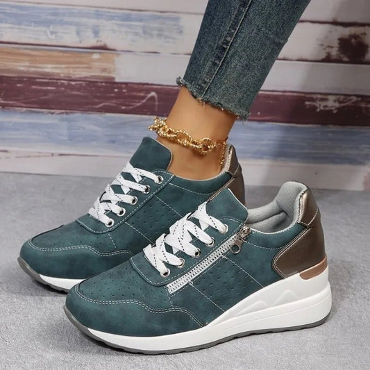 Fashionable lace-up sneakers with zipper detail and medium heel height by MANDOTOS INTERNATIONAL, displayed on a clean background.