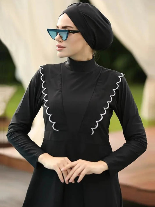 Mandotos International floral burkini swimsuit for women, modest swimwear for middle-aged women, with colorful floral pattern.