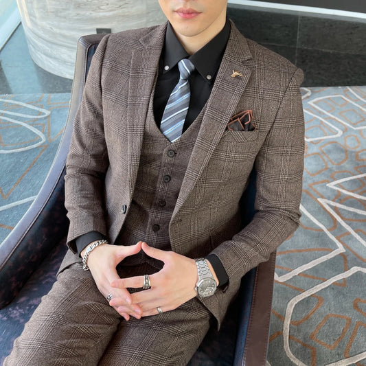 British Korean style plaid men's 3-piece business casual suit set by MANDOTOS INTERNATIONAL, featuring a tailored jacket, vest, and trousers.