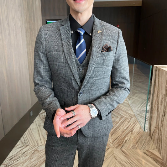 British Korean style plaid men's 3-piece business casual suit set by MANDOTOS INTERNATIONAL, featuring a jacket, vest, and trousers.