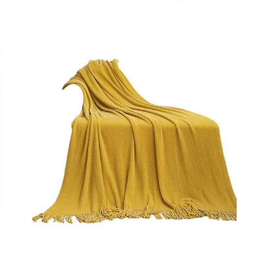 Mandotos International knitted wool throw blanket with tassels, cozy home decor and travel blanket in soft, warm fabric.