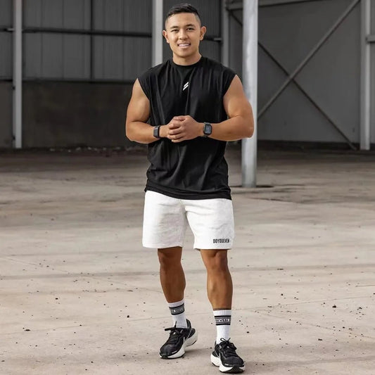 Men's quick-drying sleeveless fitness shirt, summer mesh basketball tank top by MANDOTOS INTERNATIONAL, shown on a model.