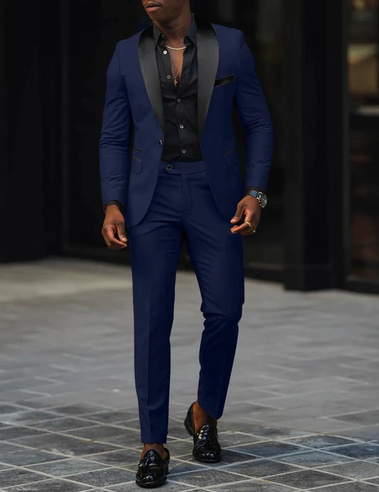 Men's slim-fit business casual suit jacket and trousers by MANDOTOS INTERNATIONAL, tailored fit, dark fabric, front view.
