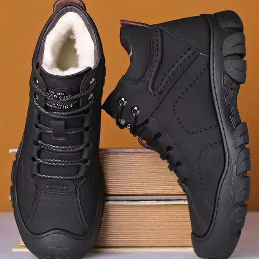 Men's winter ankle boots by MANDOTOS INTERNATIONAL, waterproof and non-slip work shoes with sturdy soles and warm lining.