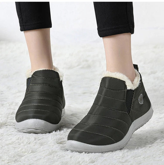 Men's waterproof winter snow boots by MANDOTOS INTERNATIONAL, outdoor work shoes in plus size with rugged traction and insulated lining.