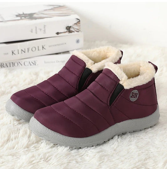 Mandotos International men's waterproof winter snow boots with rugged outdoor design, suitable for work and plus size comfort.