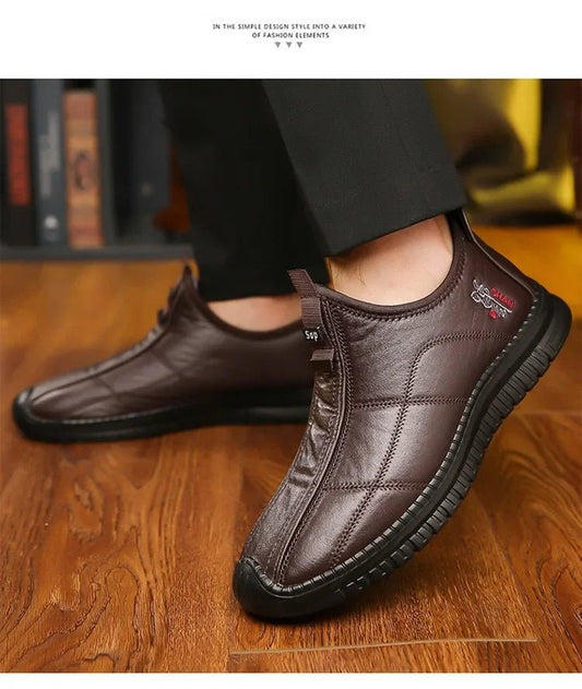 Men's winter waterproof non-slip platform work boots by MANDOTOS INTERNATIONAL, size 38-48, with sturdy soles and insulated design.