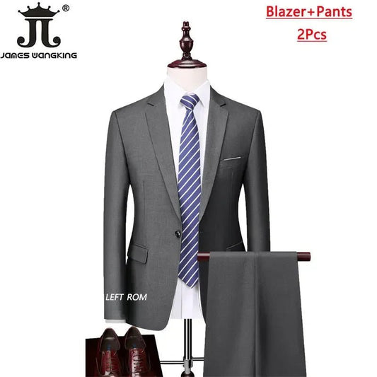 Mens 3-piece business suit set by MANDOTOS INTERNATIONAL with jacket, vest, and pants in various sizes and colors.