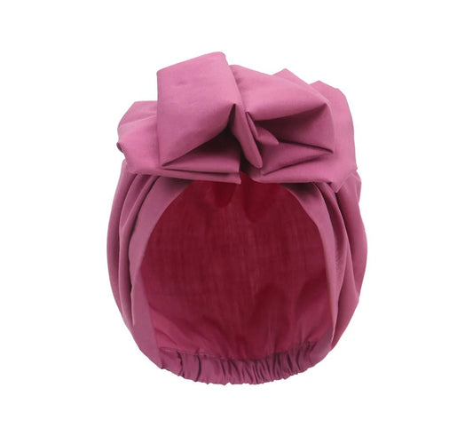 Muslim-style mirror hats and African headgear for women featuring intricate designs and vibrant patterns by MANDOTOS INTERNATIONAL.