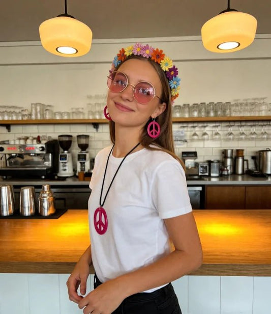 Pesenar 60s hippie costume accessory set includes flower headband, pink sunglasses, and peace sign jewelry for retro style.