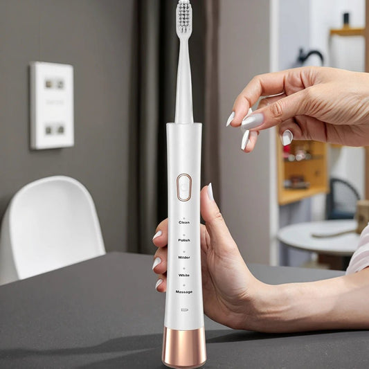 Portable electric toothbrush set by MANDOTOS INTERNATIONAL with rechargeable oral cleaner for adults and kids, compact and travel-friendly.