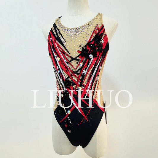 Red synchronized swimming team performance swimsuit by MANDOTOS INTERNATIONAL, featuring sleek, form-fitting design for aquatic routines.
