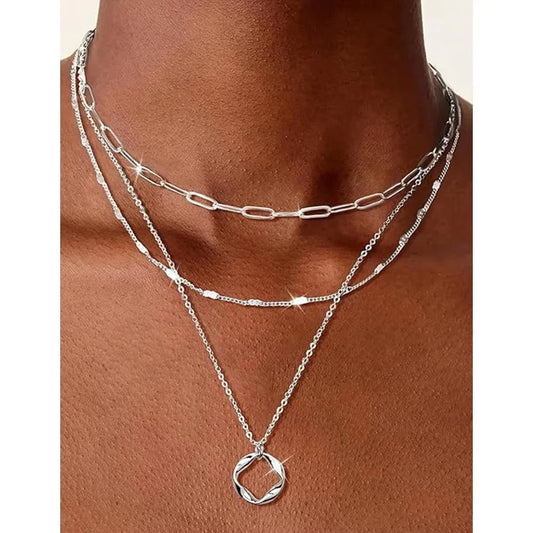 Mandotos International retro geometric pendant necklace, stylish jewelry piece with bold shapes for trendy travel outfits