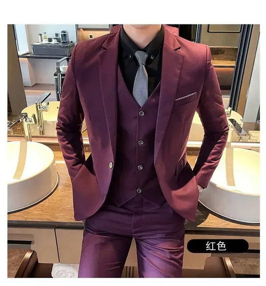 Mandotos International men's formal dress suit with blazer, vest, and pants in black, tailored for business and special occasions.