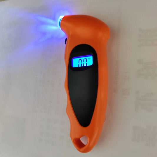 Mandotos International Smart Tire Pressure Monitor showing digital display with tire pressure readings on a car's dashboard.