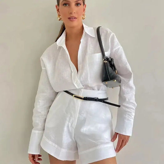 Summer fashion women's 2-piece short pant set with button details and shirt tops by MANDOTOS INTERNATIONAL, styled for warm weather.