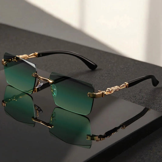 Unisex luxury frameless black and gold sunglasses with leopard print, rectangular lenses, UV400 protection, and elegant design.