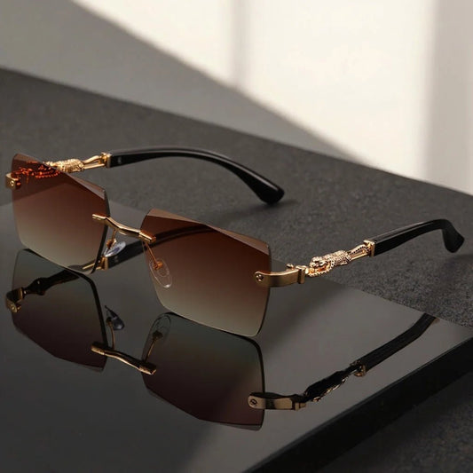 Unisex luxury frameless black and gold sunglasses with leopard print, rectangular lenses, UV400 protection, elegant design.