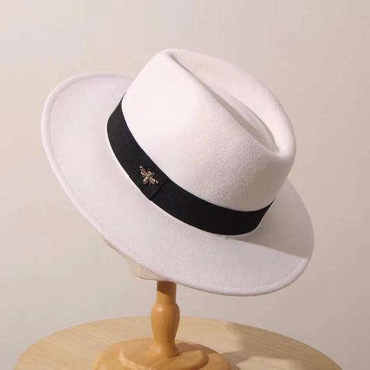 Vintage feather band wool fedora hat by MANDOTOS INTERNATIONAL, ideal for formal events and weddings, showcasing classic style and craftsmanship.