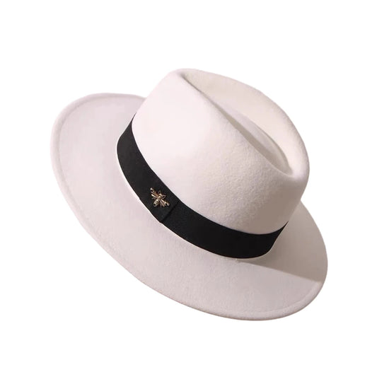 Vintage wool fedora with feather band by MANDOTOS INTERNATIONAL, ideal for formal events and weddings.