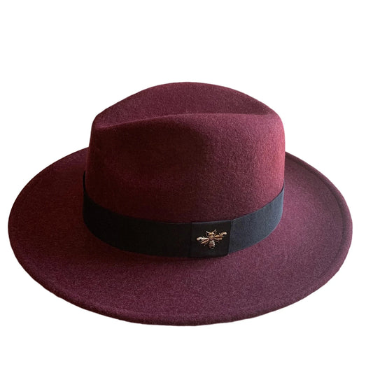 Vintage wool fedora with feather band by MANDOTOS INTERNATIONAL, ideal for formal events and weddings.