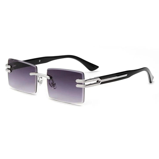 Vintage rimless sunglasses with stylish PC frames by MANDOTOS INTERNATIONAL, featuring sleek, lightweight design and modern appeal.