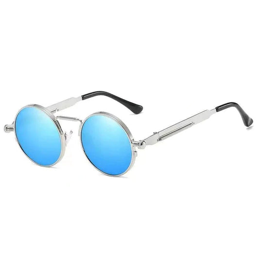 Vintage steampunk circular shades with metal frames and tinted lenses, designed by MANDOTOS INTERNATIONAL.