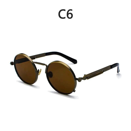 Vintage steampunk circular shades by MANDOTOS INTERNATIONAL with round metal frames and tinted lenses.