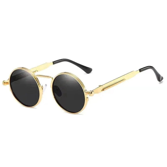 Vintage steampunk circular sunglasses by MANDOTOS INTERNATIONAL with metal frames and tinted lenses.