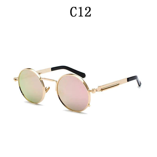Vintage steampunk circular shades by MANDOTOS INTERNATIONAL featuring round metal frames and tinted lenses.