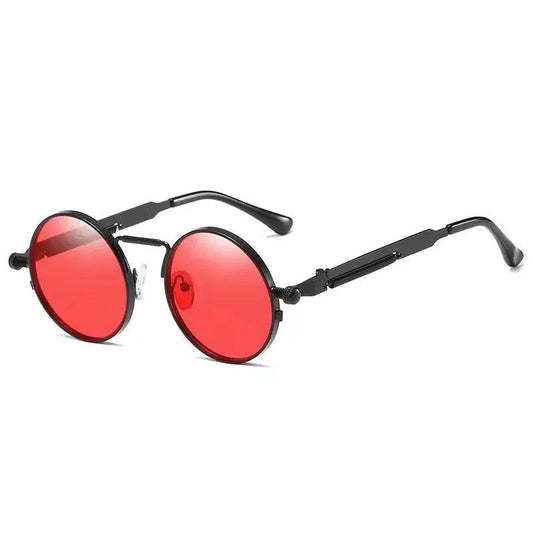 Vintage steampunk circular sunglasses by MANDOTOS INTERNATIONAL featuring round metal frames and tinted lenses.