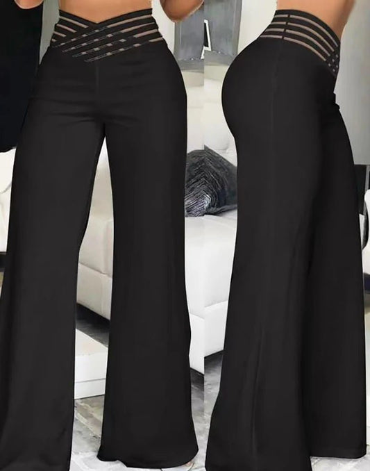 Women flared pants by MANDOTOS INTERNATIONAL featuring high waist, sheer mesh patches, wide-leg style, perfect for office or casual wear.