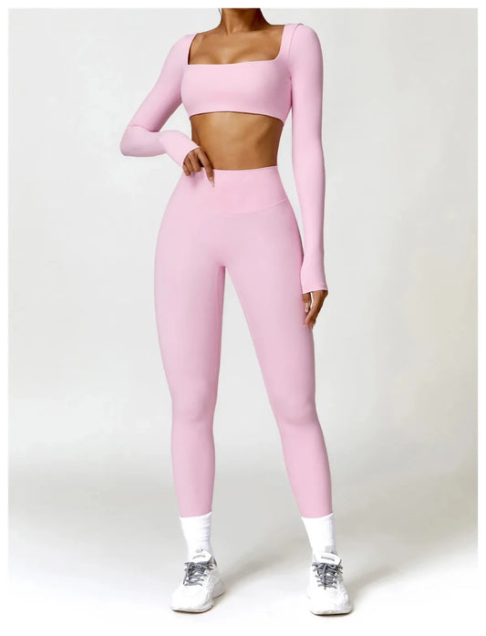 Women's long sleeve fitness T-shirt by MANDOTOS INTERNATIONAL, gym push-up top with fitted design and comfortable fabric.