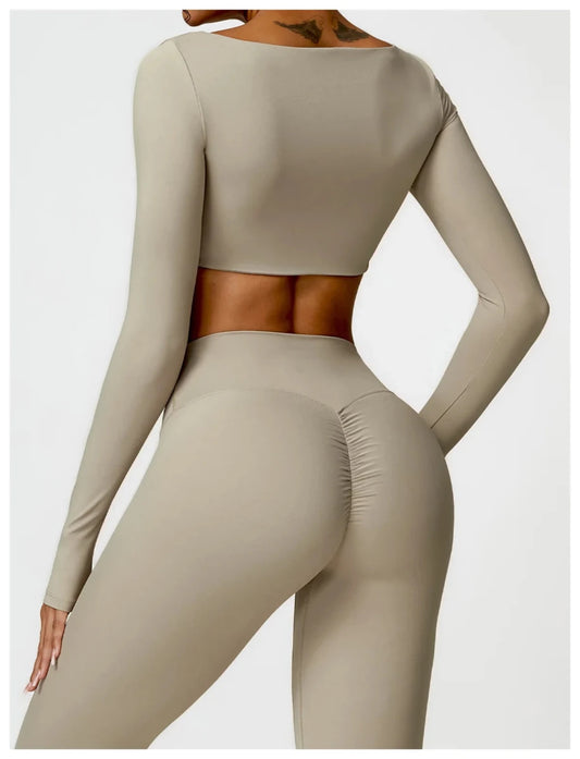 Women's long sleeve fitness T-shirt by MANDOTOS INTERNATIONAL, designed for gym workouts and push-up support.
