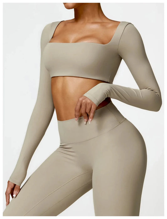 Women's long sleeve fitness T-shirt by MANDOTOS INTERNATIONAL, gym push-up top, designed for active wear and support.
