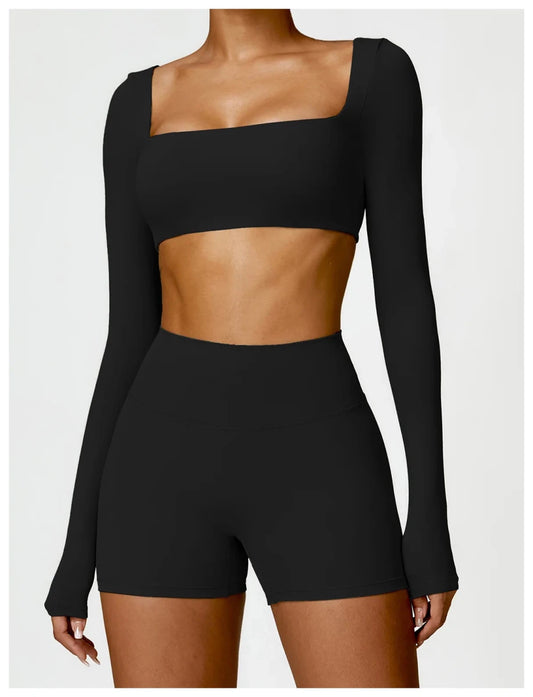 Women's long sleeve fitness T-shirt by MANDOTOS INTERNATIONAL, gym-ready push-up top, designed for active wear and comfortable movement.