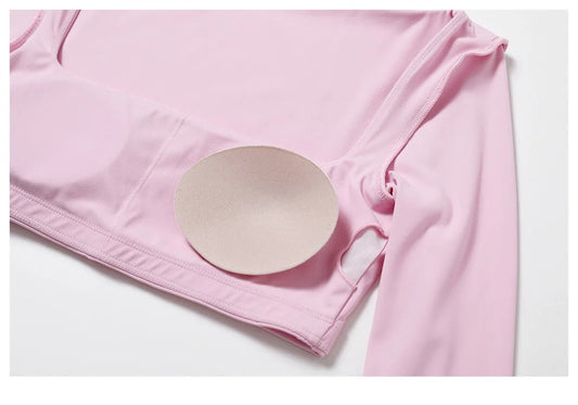 Women's long sleeve fitness T-shirt by MANDOTOS INTERNATIONAL, gym push-up top, made for active wear and comfortable workouts.