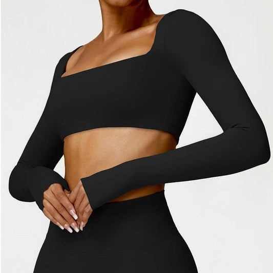 Women's long sleeve fitness T-shirt by MANDOTOS INTERNATIONAL, gym push-up top designed for active wear and comfortable workout sessions.