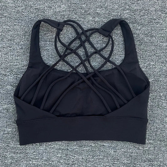 Mandotos International women's shockproof yoga crop top with anti-sweat fabric, designed for gym and sports activities.