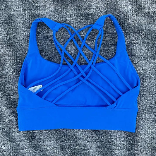 Women's shockproof yoga crop top by MANDOTOS INTERNATIONAL, anti-sweat gym sports bra designed for active workouts.
