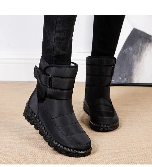 Women's waterproof winter snow boots by MANDOTOS INTERNATIONAL featuring non-slip soles and warm platform design.
