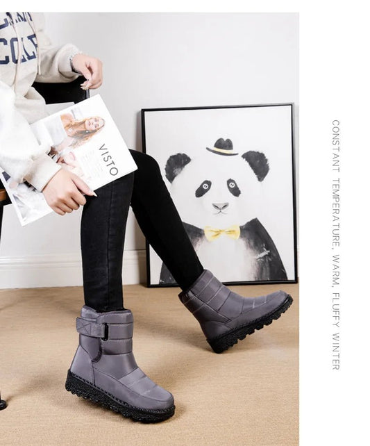 Women's waterproof winter snow boots by MANDOTOS INTERNATIONAL with non-slip soles and warm platform design, ankle height, stylish and functional.