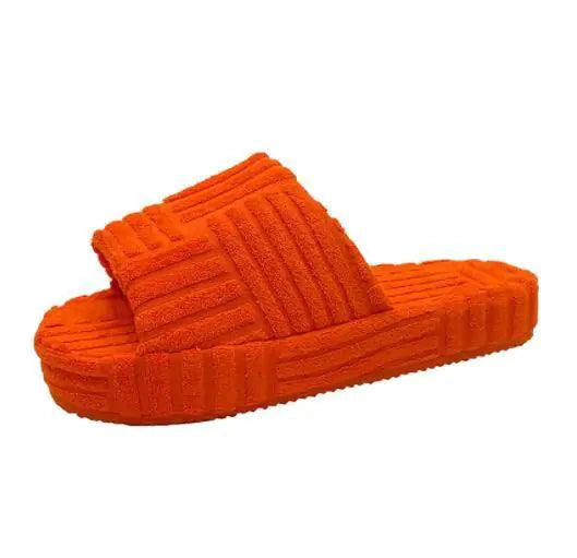 Mandotos ladies' plush slip-on slippers with soft, cozy interior and stylish design for comfortable indoor wear.