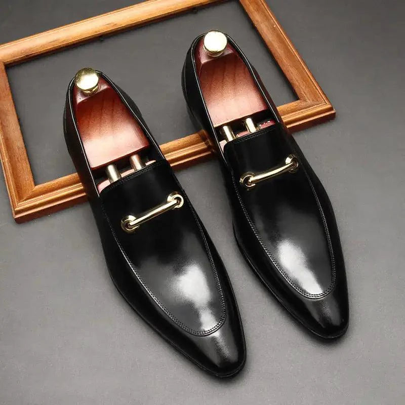Mandotos men's leather loafers showing classic slip-on style with smooth black leather and detailed stitching.