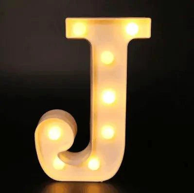 Mandotos luminous letter lights spelling out decorative alphabet letters, warm glow for home decor or party ambiance.