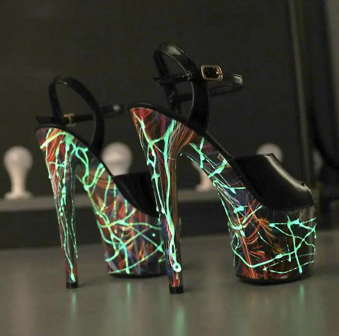 Mandotos lustrous leather stilettos with pointed toes and sleek high heel, showcasing elegant footwear design.